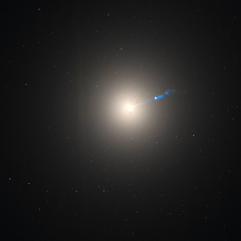 A bright elliptical galaxy with a faint jet.